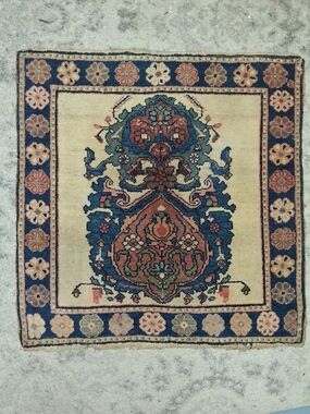 authentic, 80-year-old Turkish Yastik rug in this 22" x 22"